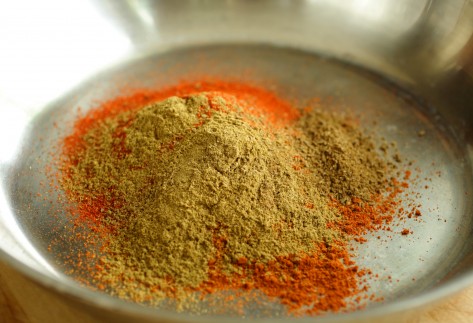 The ground spices used in pilpelchuma--cayenne pepper, sweet paprika, ground cumin, and ground caraway seeds--are toasted to enhance flavor.