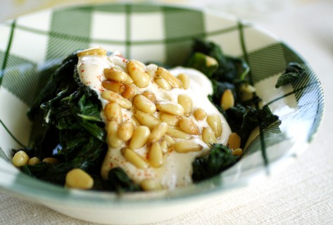 Swiss chard with tahini sauce and buttered pinenuts